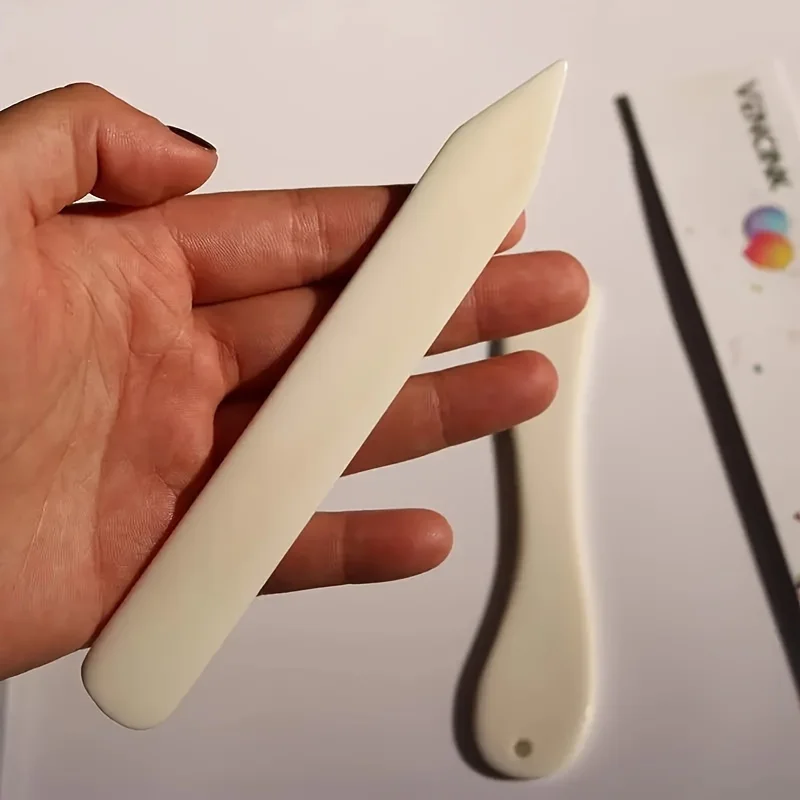 أداة طي وتجعيد أصلية من الجلد  - مراجعة Bone Folder Tool وسعره