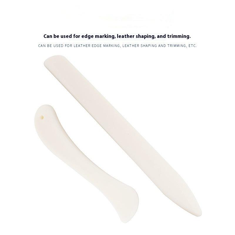 قطعتان من أدوات العمل بالجلد،  - مراجعة Bone Folder Tool وسعره